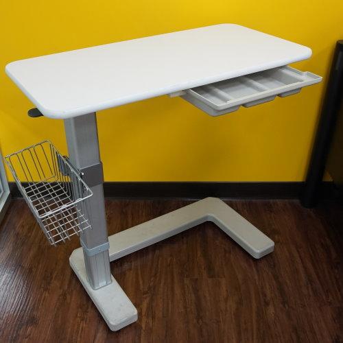 Low-profile C-shaped mobile base over-bed table